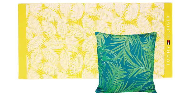 Palm Beach Towel in Sunny, £65, Tommy Hilfiger; Malini Palm Print Fabric Cushion, Blue and Green, £25, Cult Furniture
