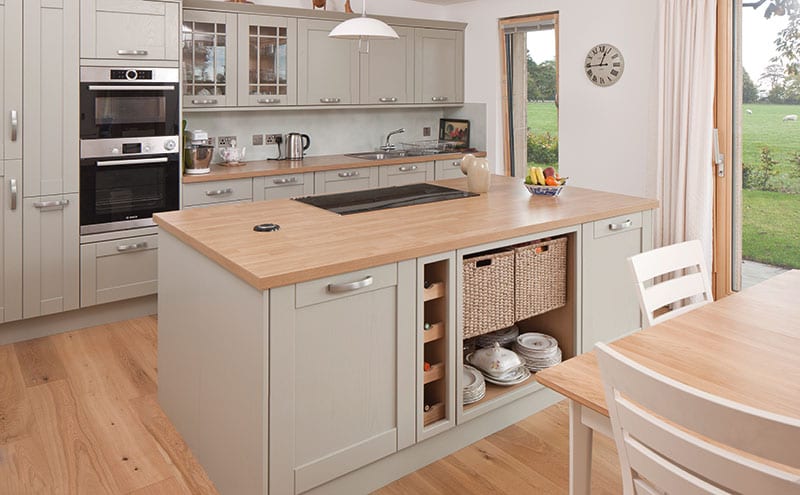 The Howdens kitchen has a hint of Shaker aesthetics, giving just a nod to country styling.