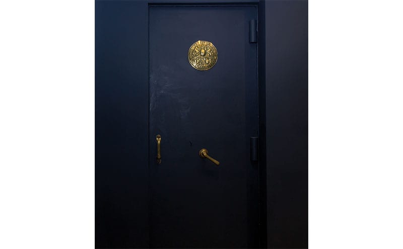 When the law firm moved out, they left behind an old walk-in safe in the basement. Now painted, it has become an intriguing feature of the property. 