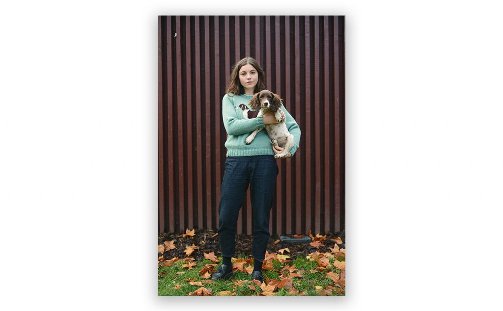 woman holding dog