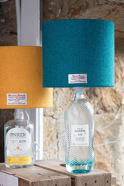 Recycled gin bottles are now table lights by Tara Pollock