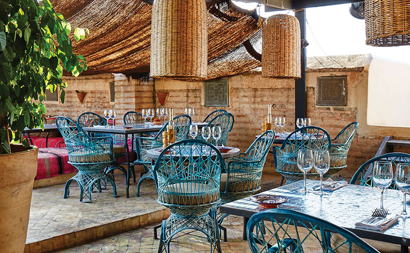 Food and drink are a big part of the atmosphere at El Fenn, and the roof terrace is a special spot for enjoying an afternoon mint tea or a cocktail at sundown. Authentic rattan and traditional tiles, lemon trees and colourful textiles add to the Moroccan ambience