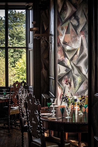  A mural by Argentina’s Guillermo Kuitca in the Clunie dining room references the waters that run through the village