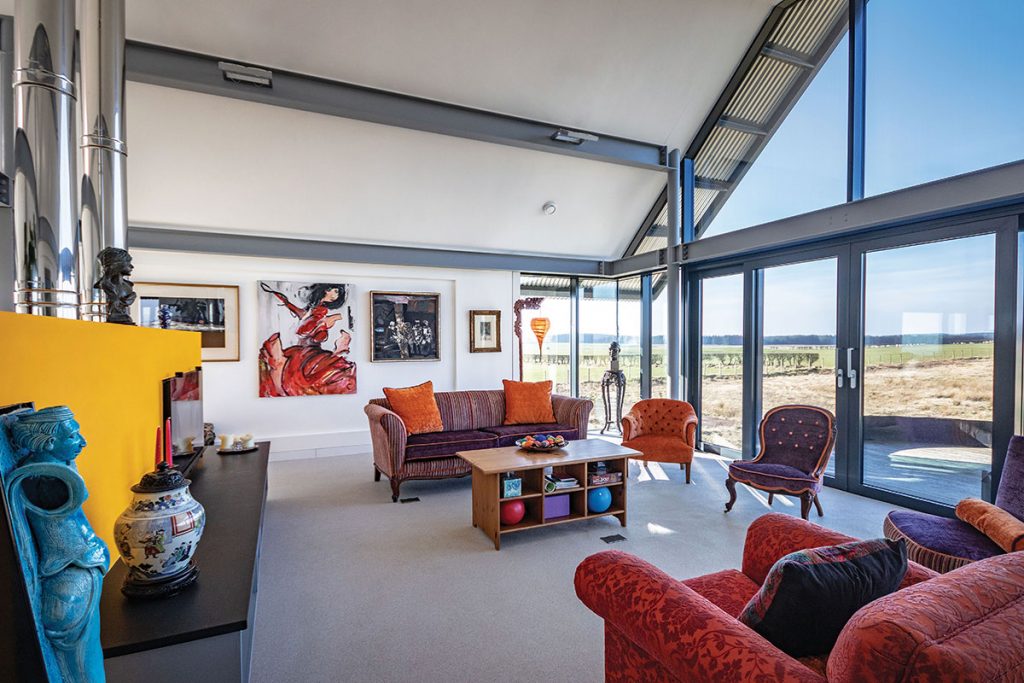 bright-colourful-living-room-with-large-windows