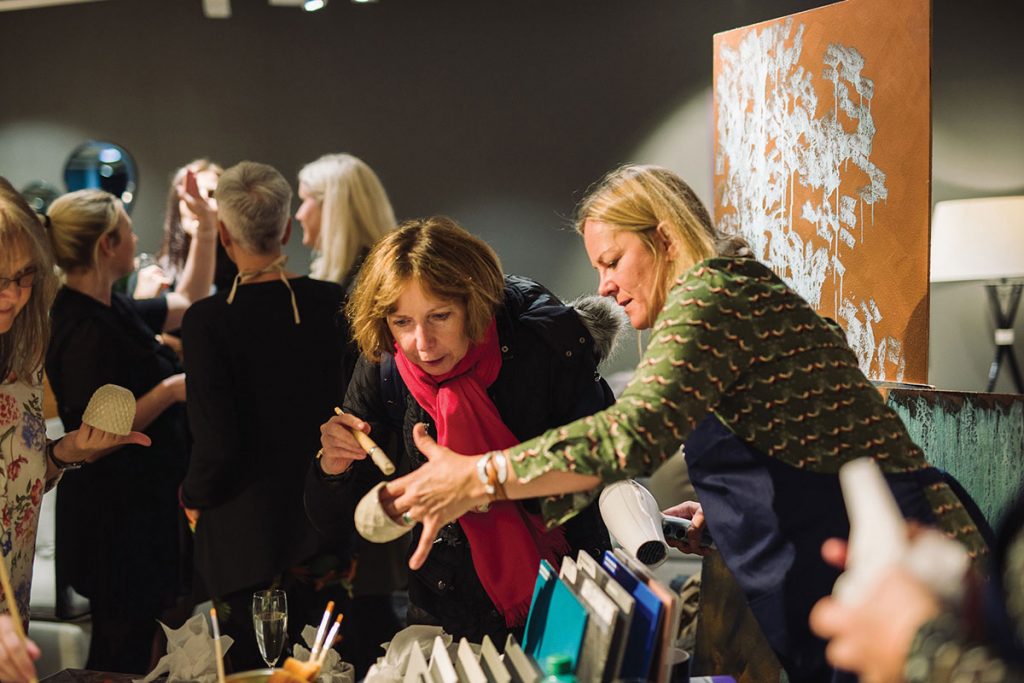 guests-touching-ceramics-at-boconcept