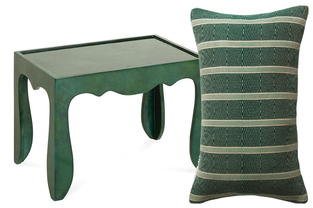 green-table-and-patterned-cushion
