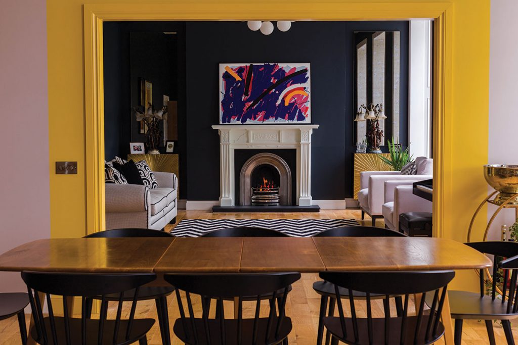 dining-area-through-to-living-room-with-navy-walls
