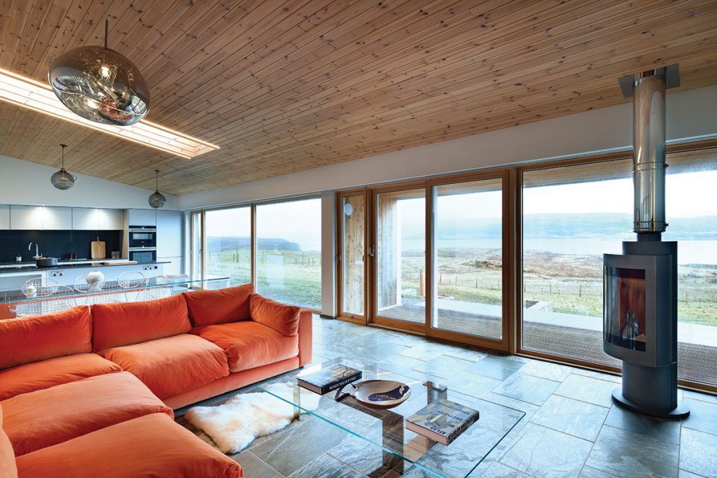 living-room-with-log-burner-and-orange-sofa