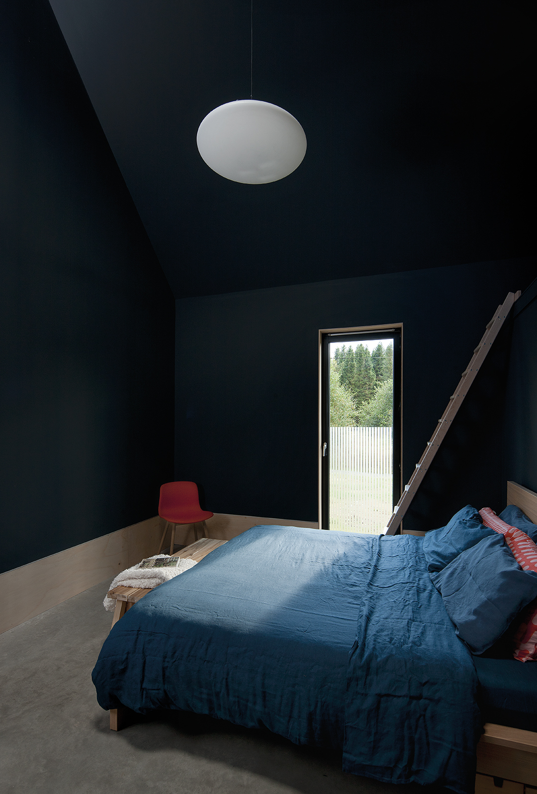 bedroom, dark walls, picture window, exterior views 