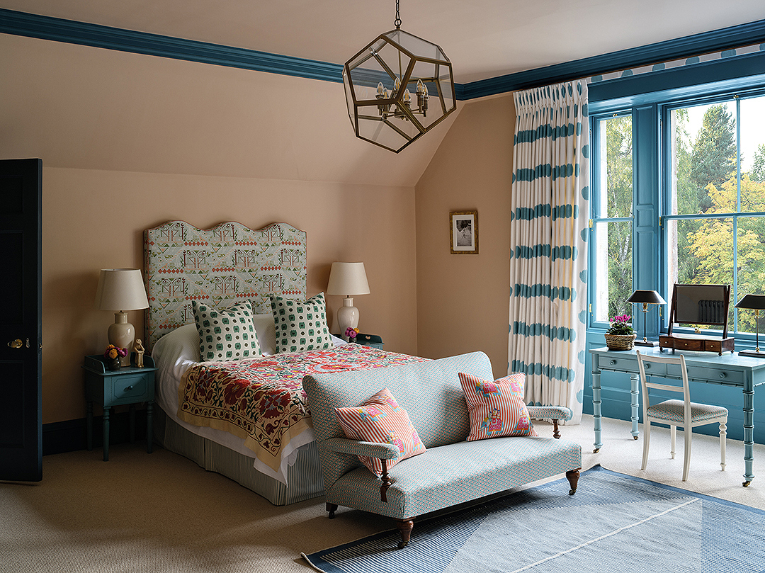 pretty, colourful main bedroom. Contemporary lighting, texture, pattern